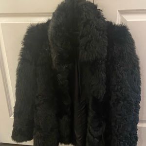 Real black lamb jacket. Size 40. Hook closures. Beautiful